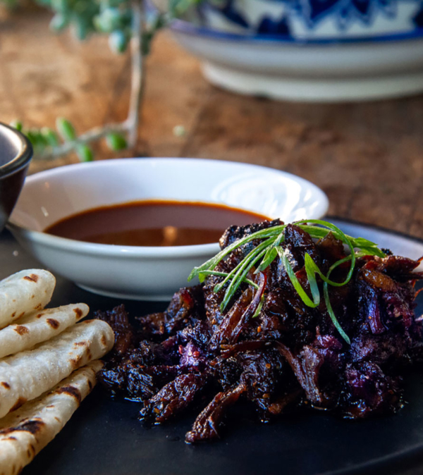 Chinese pancakes with cumin spiced twice cooked lamb, cucumber pickle & house made hoisin (4 pcs)