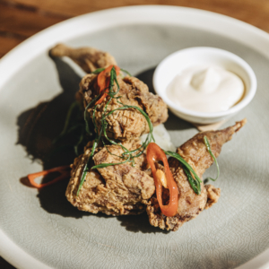 Salt and pepper quail with pickled fennel, sesame mayo